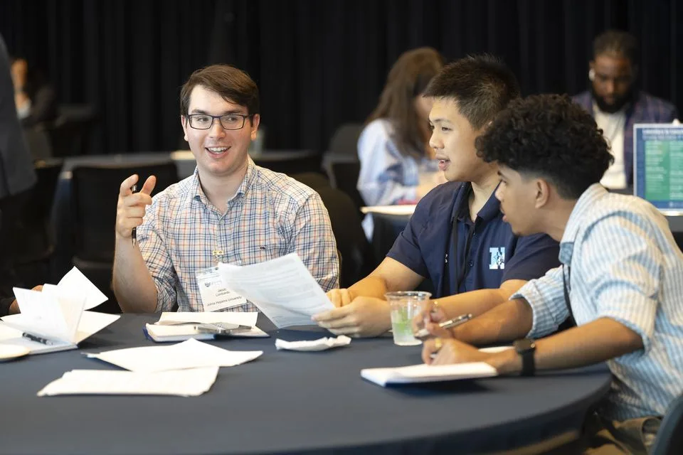 Students working together at the tables