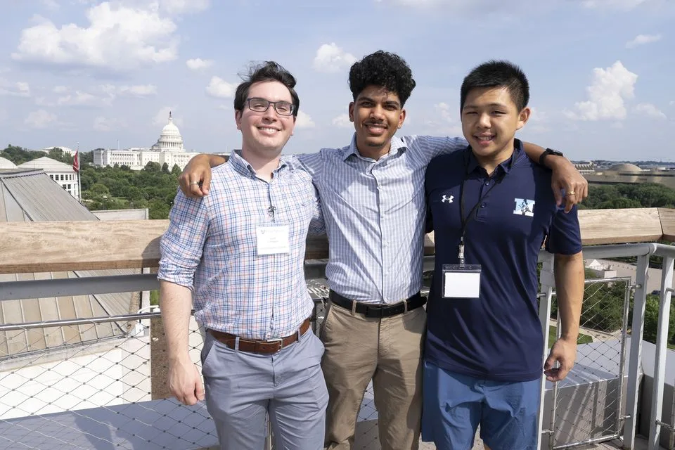 Students on the terrace, with the Capitol behind